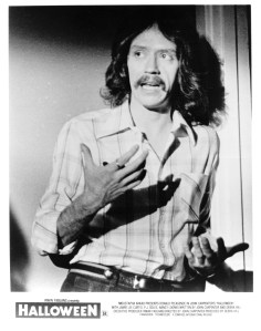 John Carpenter on the set of Halloween in a rare publicity shot for the film.
